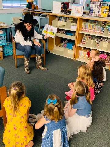 Teacher reading to students